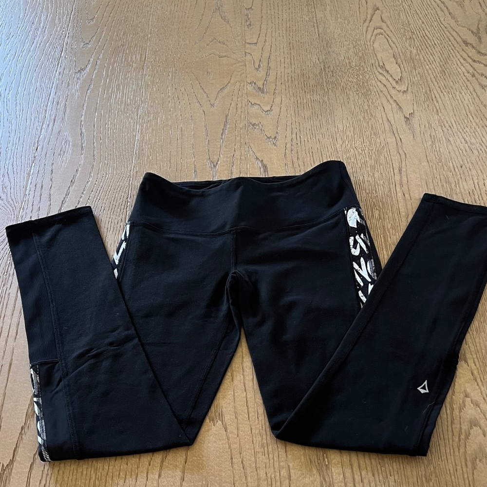 Ivivva Black Leggings with White Graphic Side Panels